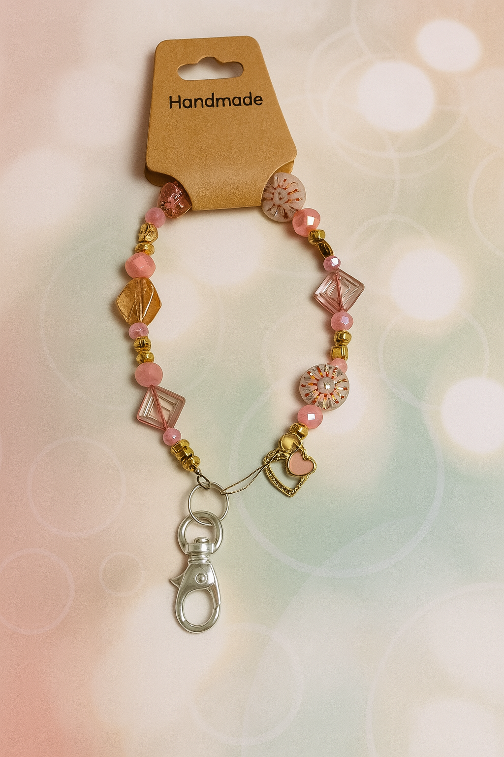 Pink and gold phone charm